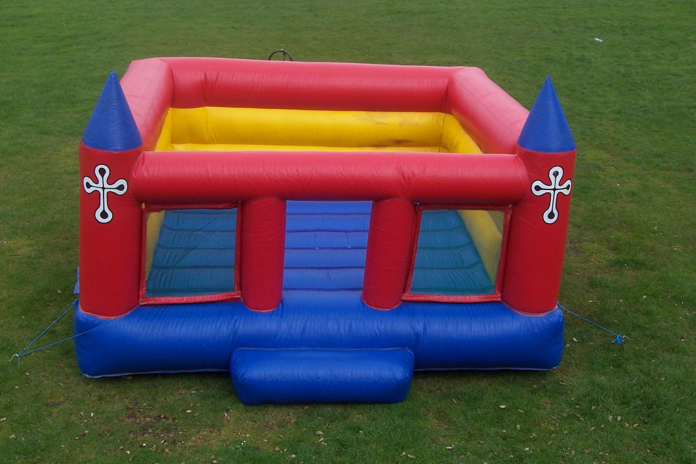 This Low Wall Bouncy Castle is perfect for use in halls with ceilings less than 8 feet high. Spacious and super bouncy, this castle is suitable for children up to the age of 13. Children must be supervised, as with all of our castles.