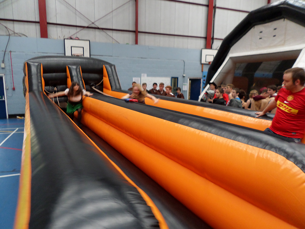 Put your strength to the test with this challenging fast-paced Bungee Run! Race against friends to see who can place their marker the furthest before the harnesses pull you back! Popular for corporate events such as festivals, carnivals, school fairs and school leavers parties! Suitable for all ages.