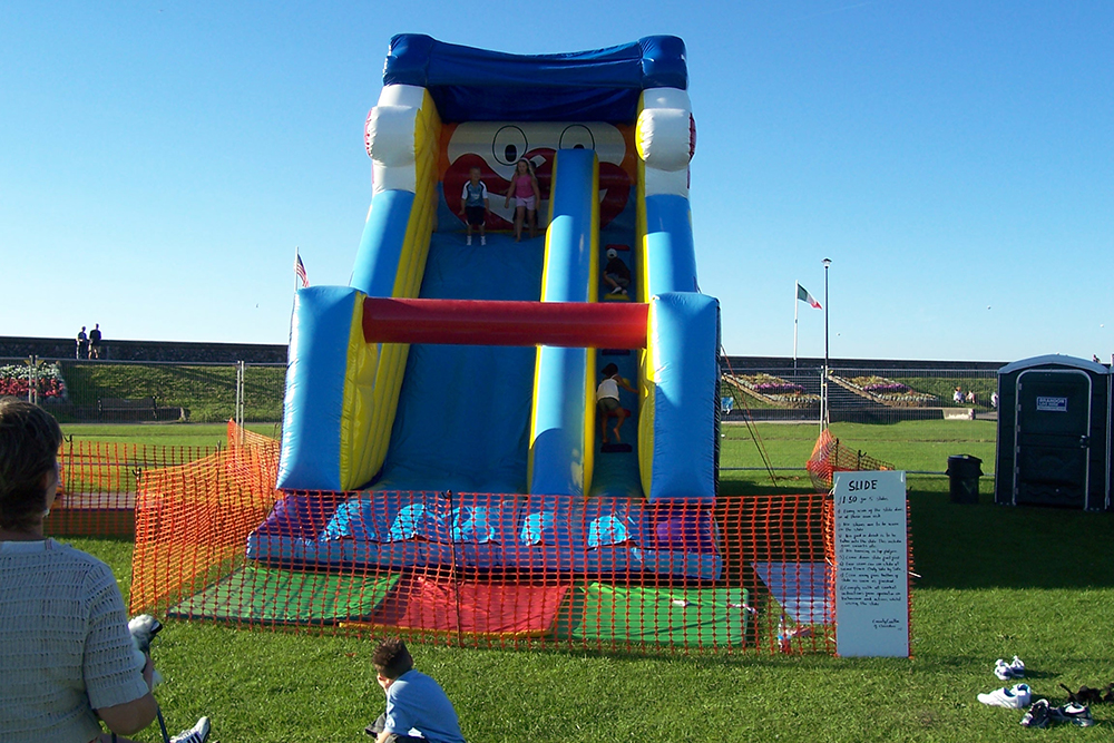 This huge slide is perfect for outdoor parties during the summer months, with endless sliding on one of our most popular inflatables. Race friends and try not to fall down as you climb to the top of this giant castle! Suitable for all ages.